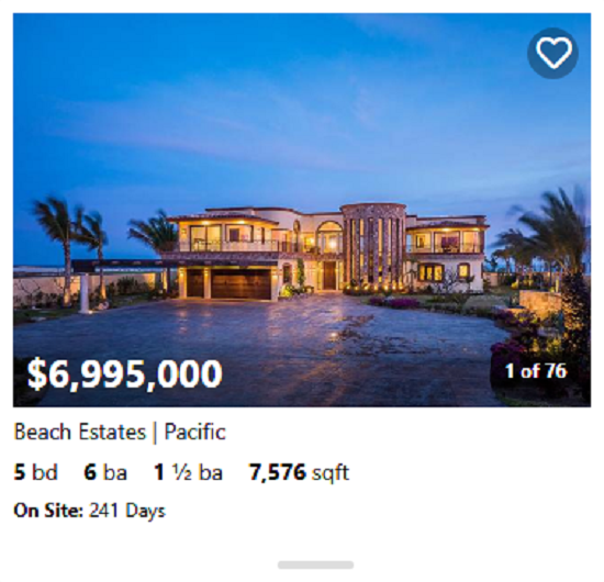 Golf course villa in Diamante with shaded patio, outdoor bar, and serene desert landscaping